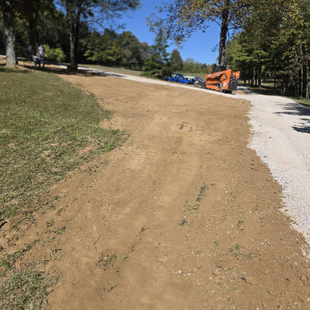 A driveway graded ready for new gravel